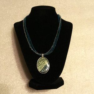 Lovely KC Co. beaded necklace with oval pendant